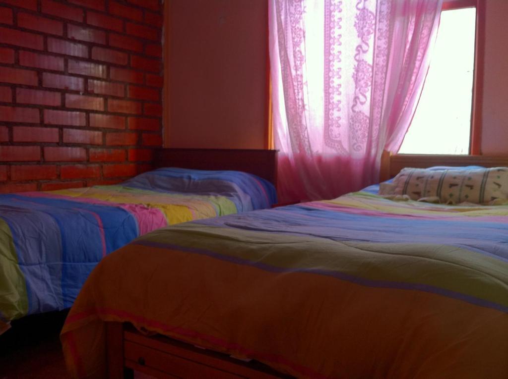Hostel Melinda Πουέρτο Νατάλες Δωμάτιο φωτογραφία